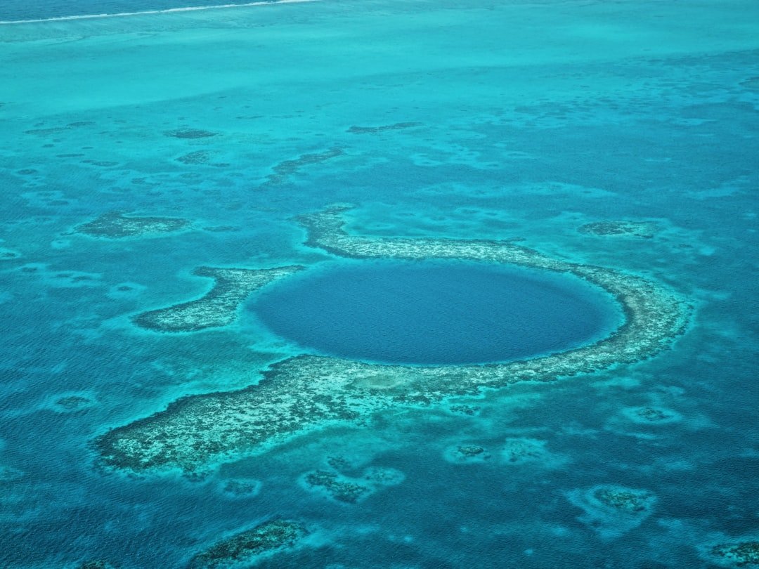 Photo by Agnes Lee A large blue hole in the middle of the ocean