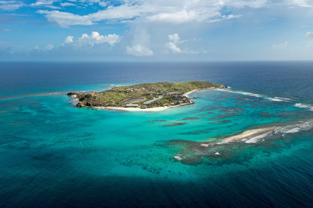 Photo by Kevin Wolf aerial view photography of island